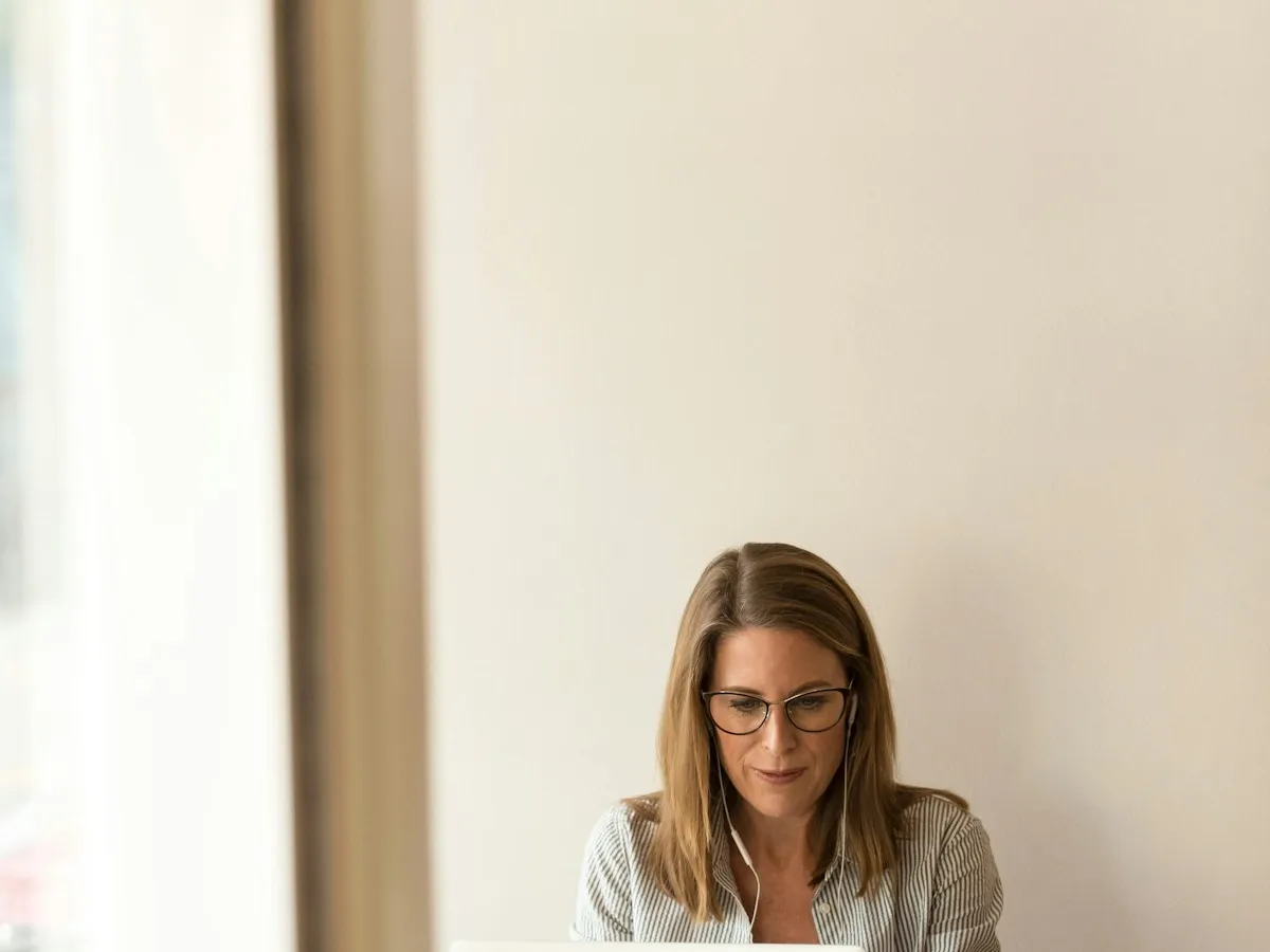Focused professional working through a client's books