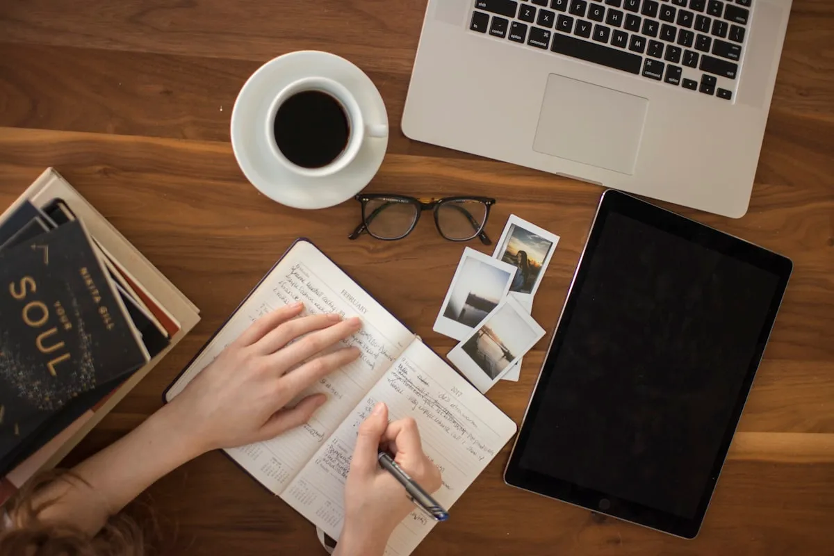 Desk with a notebook, ready to answer common QuickBooks questions