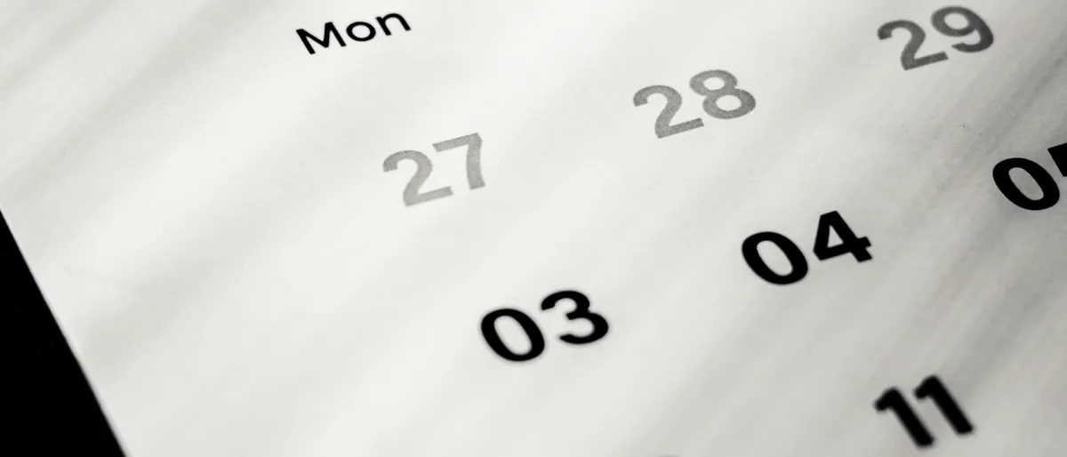 A wall calendar marking off the end of the month