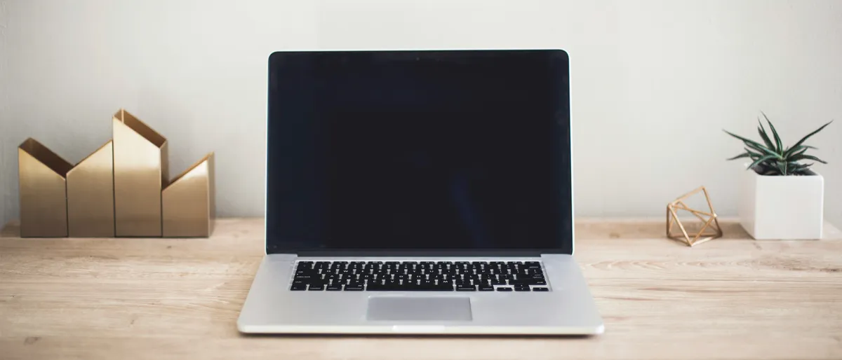Two computer monitors side by side on a desk